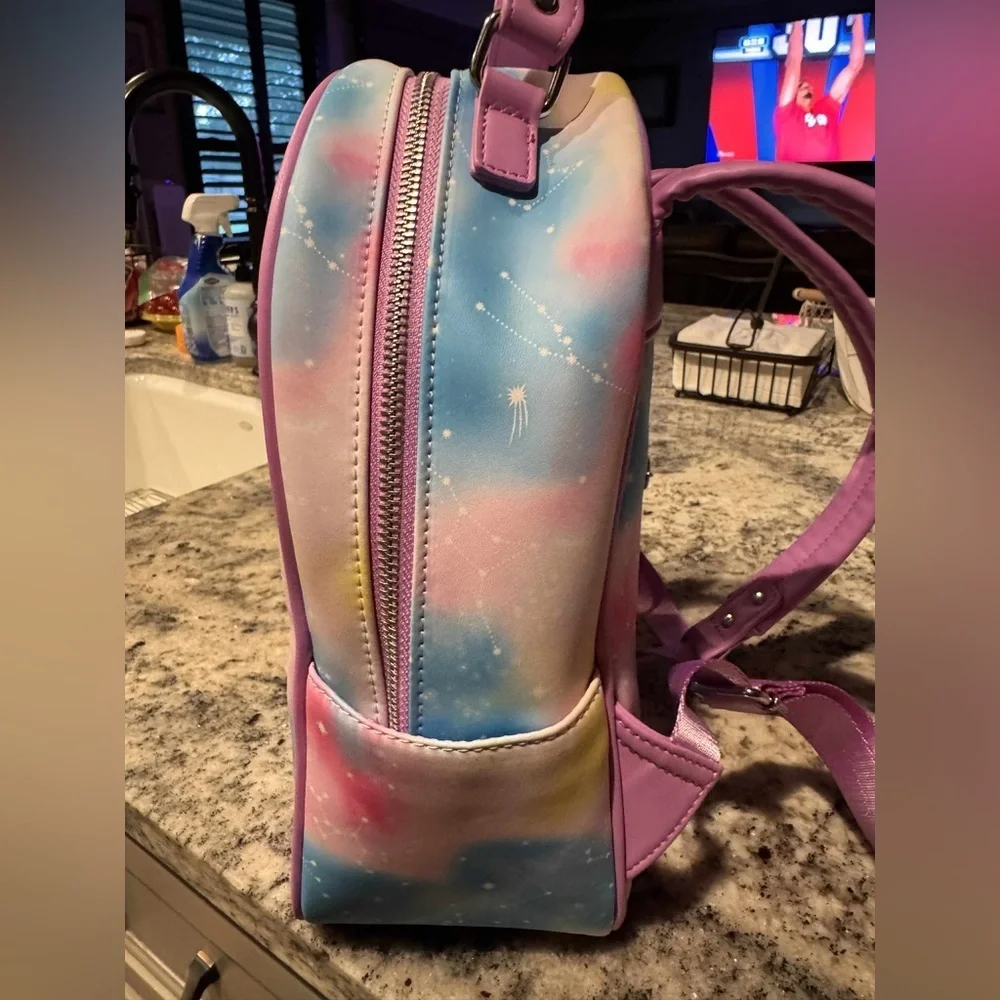 Loungefly Disney Mickey Mouse Pastel Sky Backpack** 2 light scuffs on the front.